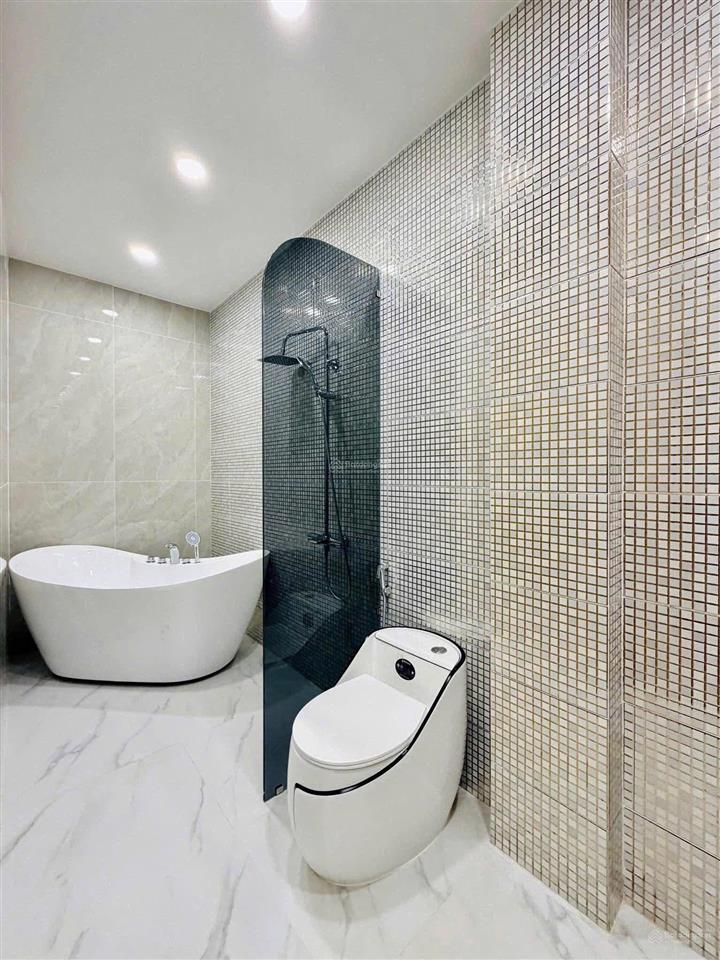 Nhà hẻm xe hơi có sổ đẹp nguyễn văn linh quận 7  giá chỉ 4.99 tỷ(tl), dt lớn 90m2, có hđ thuê sẵn
