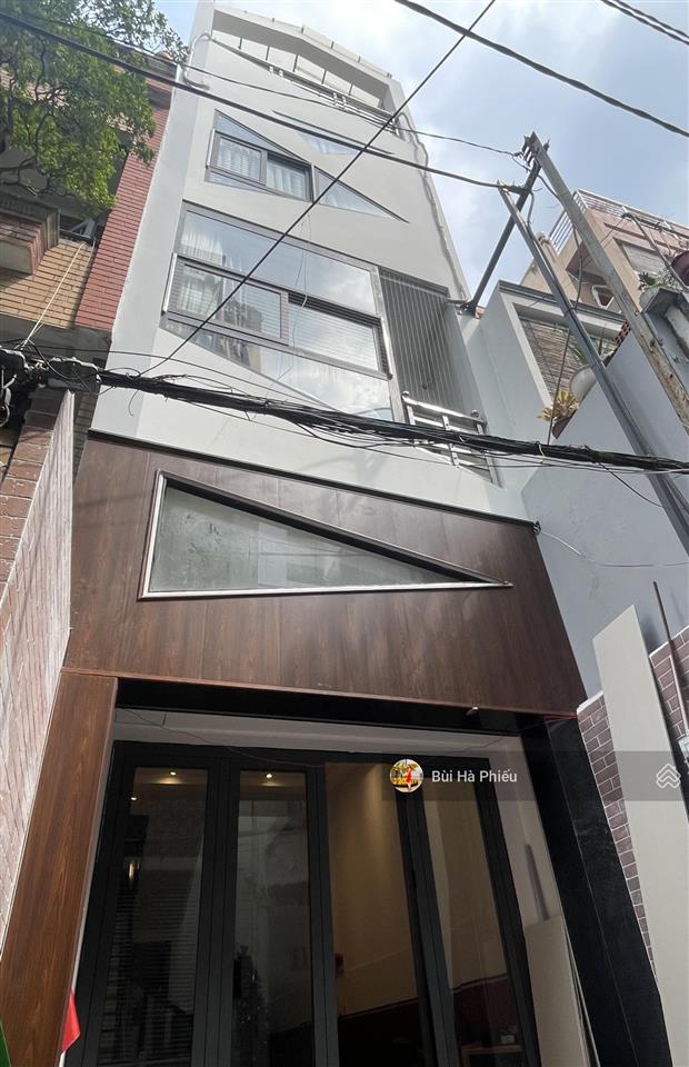 Bán chdv 7pn  5 tầng hai bà trưng q1 nhà thờ tân định  thang máy  dòng tiền 680tr/năm  17.9 tỷ