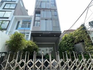 Tòa nhà văn phòng bình thạnh  ngang 6.5m nở hậu 14.5m  có hầm thang máy  sổ hồng riêng