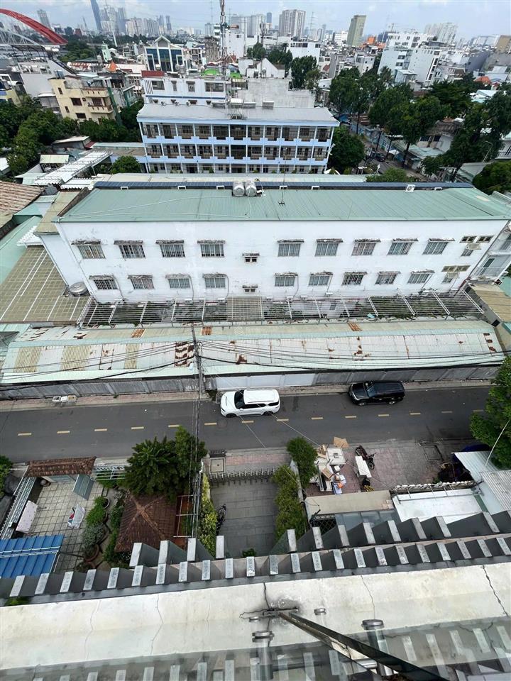 Tòa nhà văn phòng bình thạnh  ngang 6.5m nở hậu 14.5m  có hầm thang máy  sổ hồng riêng