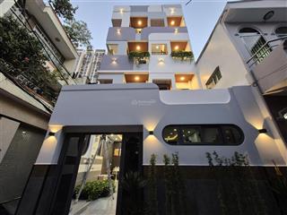 Toà nhà 14 chdv góc 3 mặt tiền hẻm mới 100%  có thang máy