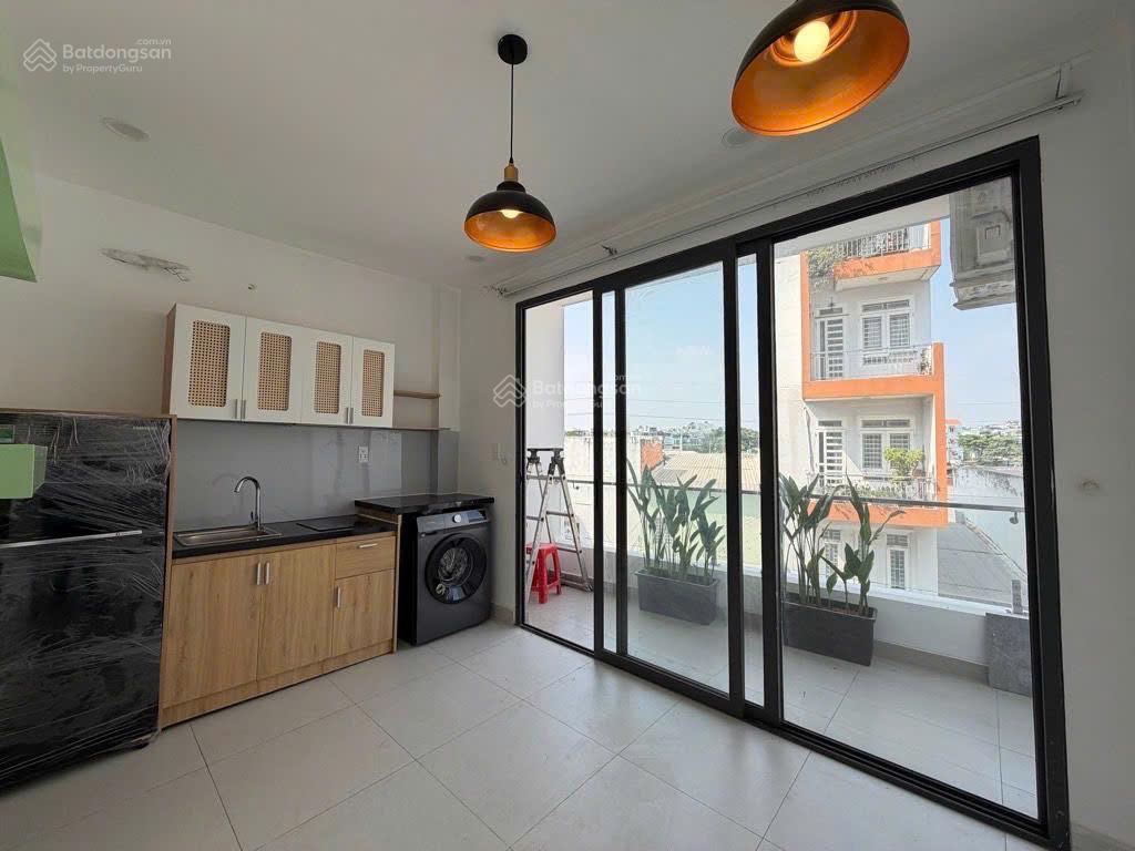 Bán nhà xây có hầm + thang máy  mặt tiền đường nguyễn xí nối dài  13 tỷ