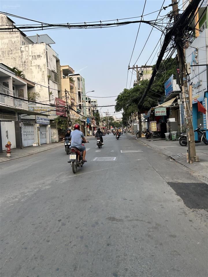 Nhà 5.7 x 20m  xây 4 tầng mới  cạnh bùi đình túy  bán 15 tỷ