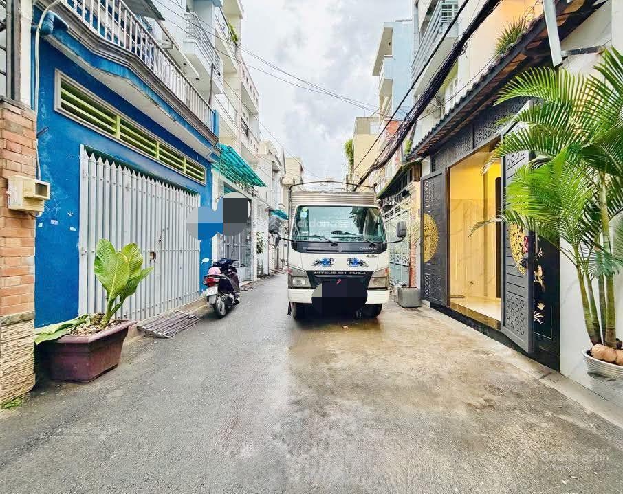 Bán nhà giá 4tỷ850/85m3, đường oto trần nhật duật  quận 1, cho thuê 32tr, gần chợ tân định
