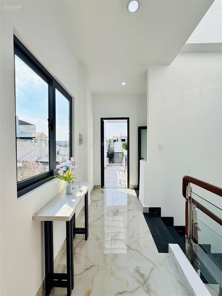 Bán nhà mặt tiền nguyễn phi khanhtân địnhq1. giá 4tỷ5 dt 73m2 đang cho thuê 28tr. nhà lửng 2 lầu