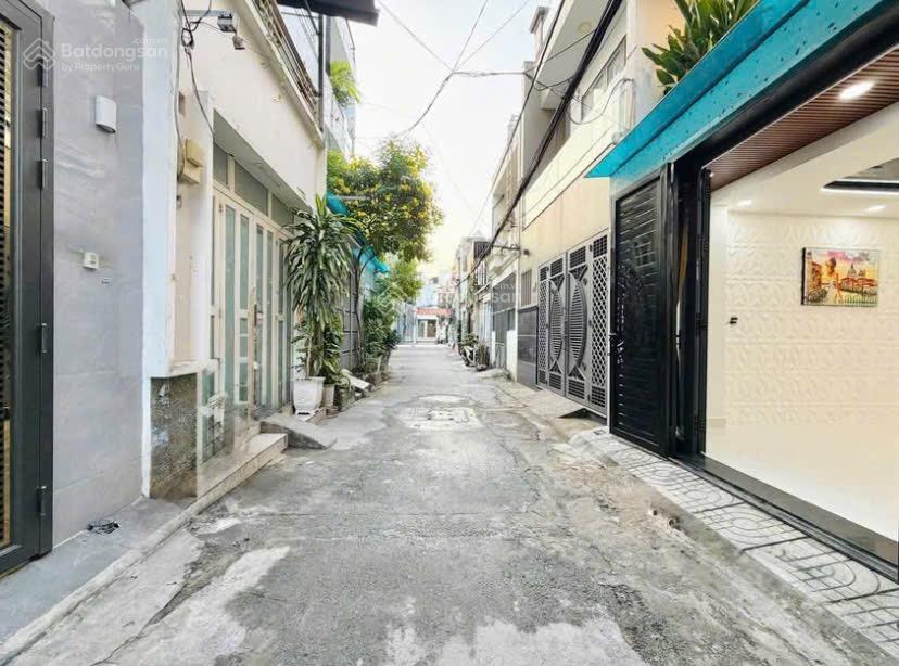 Bán nhà đường 2 ô tô né nhau phan huy ích p14 gò vấp sát bên emart. 2tỷ8/70,3m2 đang cho thuê 21tr