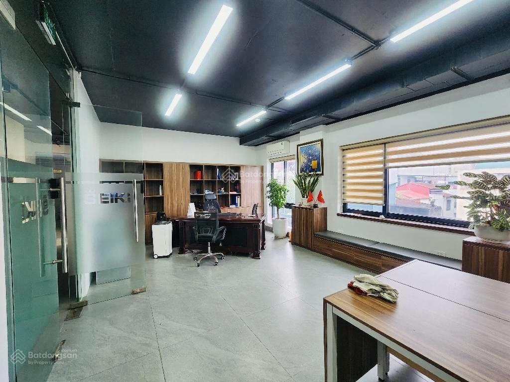 Bán tòa nhà 9 tầng giải phóng  tương mai  ô tô  kd văn phòng  235m2 x 9t. giá bán 107,5 tỷ