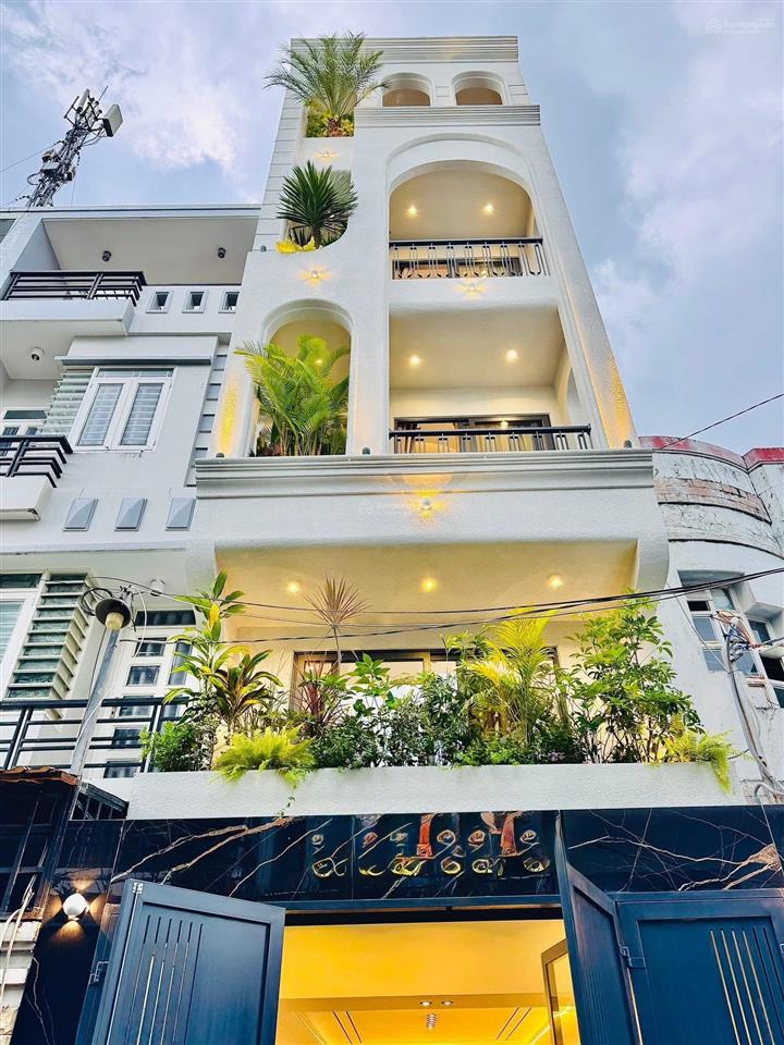 Đi đức định cư bán nhà 2tỷ890/57m2, đường 22  quận 11 (đường xe hơi). cách trường đua phú thọ 100m