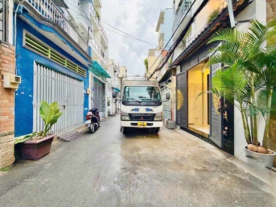 Nhà hẻm 1 sẹc rộng 7m ngay huỳnh mẫn đạt, q5  dt 70m2. không tranh chấp. sổ sẵn
