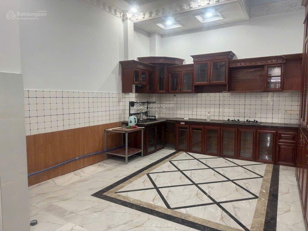 Bán nhà hẻm xe hơi,64 m2 xây 4 tầng chỉ 6.99 tỷ,lê đức thọ,quận gò vấp