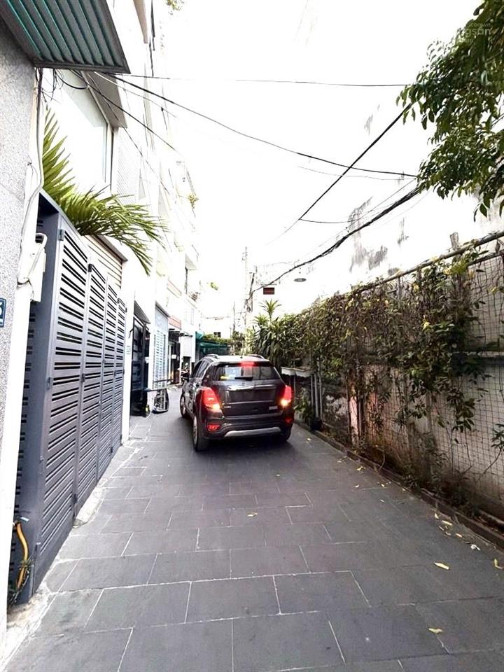 Hẻm bự xe hơi tới nhà  5 tầng  52m2  gần chợ bà chiểu  dòng tiền 23tr/tháng