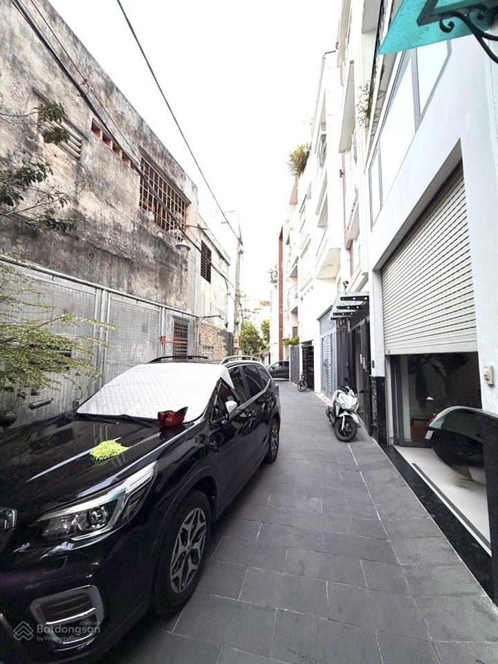Hẻm bự xe hơi tới nhà  5 tầng  52m2  gần chợ bà chiểu  dòng tiền 23tr/tháng