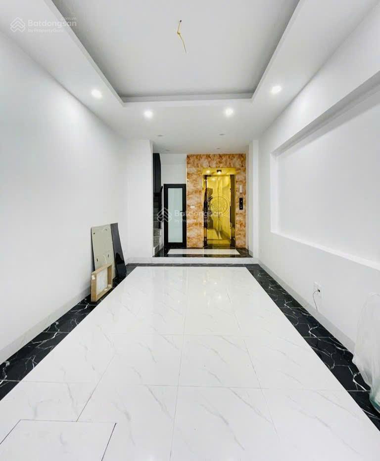 Cực hiếm nhà kim giang 34m lô góc 6 tầng thang máy  ngõ thông tứ phía  sát mặt phố
