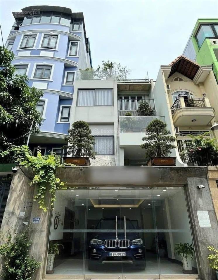 Bán nhà hxh nguyễn cửu vân sát quận 1  165m2  hđt 100tr/tháng 4 tầng  29 tỷ.