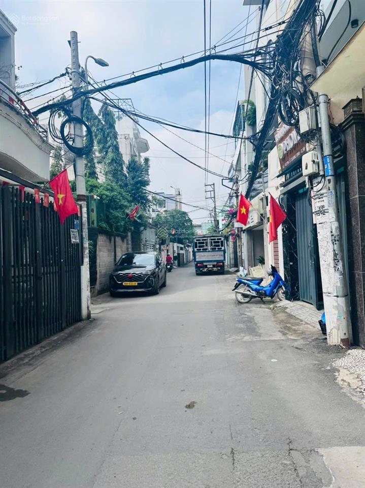 Bán nhà hxh nguyễn cửu vân sát quận 1  165m2  hđt 100tr/tháng 4 tầng  29 tỷ.
