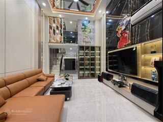 Nhà đẹp huỳnh văn nghệ, p12, gv  4pn 7wc  5 tầng  thang máy  gara ôtô  full nội thất xịn