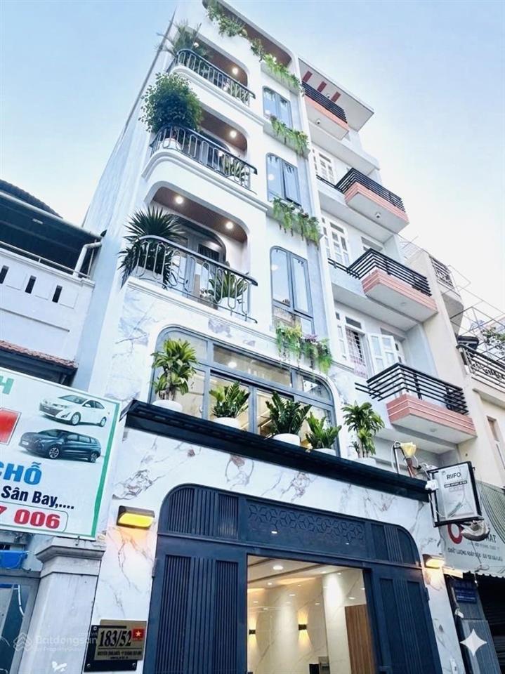 Siêu phẩm 6 tầng  thang máy  6 phòng ngay gần công viên làng hoa  hẻm xe hơi  có gara ô tô
