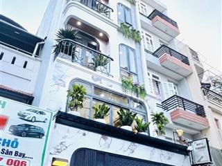 Siêu phẩm 6 tầng  thang máy  6 phòng ngay gần công viên làng hoa  hẻm xe hơi  có gara ô tô