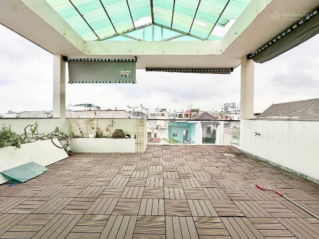Biệt thự mini 4 tầng, 6,5m x 15m, hẻm 6m gần mặt tiền lê đức thọ, có gara ô tô, ngay chợ an nhơn