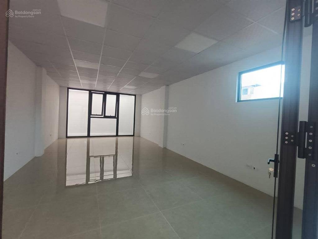 Tòa nhà vp mặt phố đào tấn  diện tích 160m2  mặt tiền 6.5m  vỉa hè 5m  thang máy  giá 122 tỷ