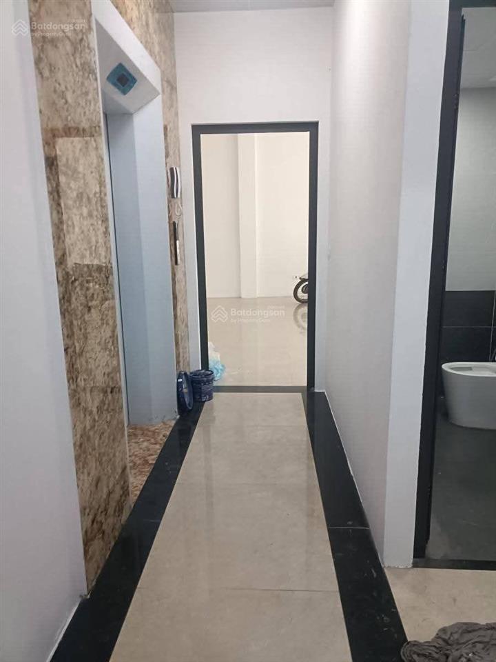 Tòa nhà vp mặt phố đào tấn  diện tích 160m2  mặt tiền 6.5m  vỉa hè 5m  thang máy  giá 122 tỷ