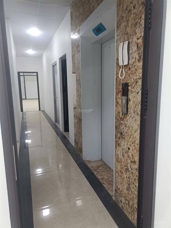 Tòa nhà vp mặt phố đào tấn  diện tích 160m2  mặt tiền 6.5m  vỉa hè 5m  thang máy  giá 122 tỷ