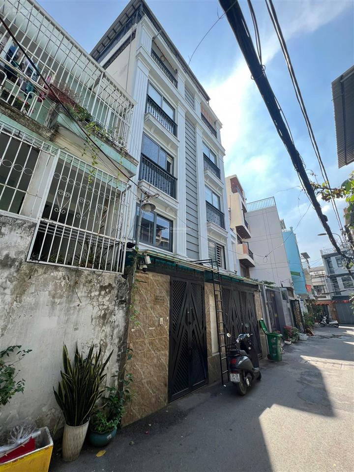 Bán chdv quang trung p10 dt 6.88x22m nh 8m dt 140m2 dtsd 482.2m2 thu nhập 80 tr/tháng giá 21 tỷ