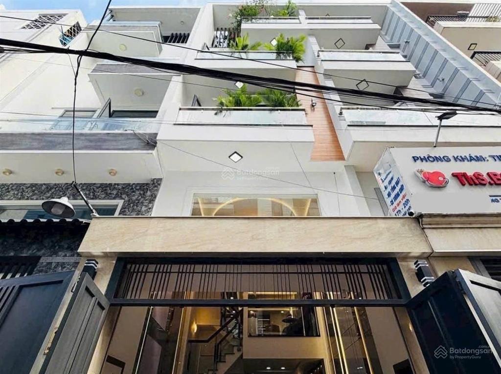 Nhà đẹp hẻm 5m nơ trang long, bình thạnh giá 3 tỷ 100. gần chợ nguyễn xí, xây trệt 3 lầu. sổ riêng