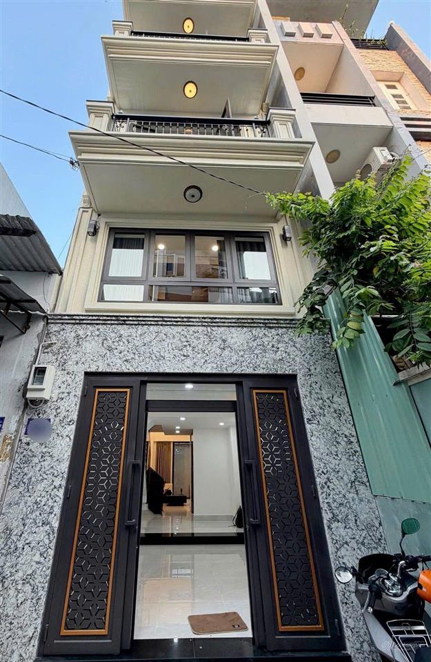 Cần bán nhà ngay rạch miễu đường hoa mai, p. cầu kiệu  giá 4,65 tỷ  dt 52m2, hợp đồng 22 triệu/th
