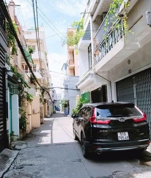 Hiếm! bán nhà mặt tiền hẻm phan đăng lưu, phú nhuận gần 100m2, ô tô đậu trong sân, dòng tiền có sẵn