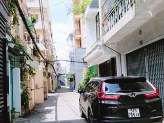 Hiếm! bán nhà mặt tiền hẻm phan đăng lưu, phú nhuận gần 100m2, ô tô đậu trong sân, dòng tiền có sẵn