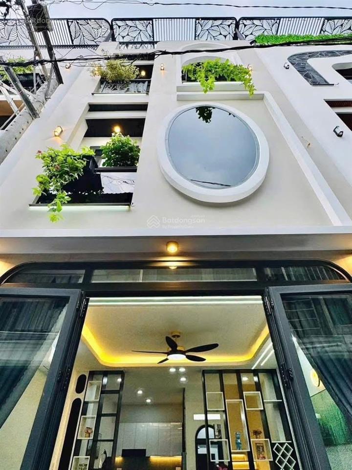 Hạ giá 200tr còn 2 tỷ250 triệu bán gấp nhà lê quang định bình thạnh, 2 pn,hẻm xe hơi, sổ hồng riêng