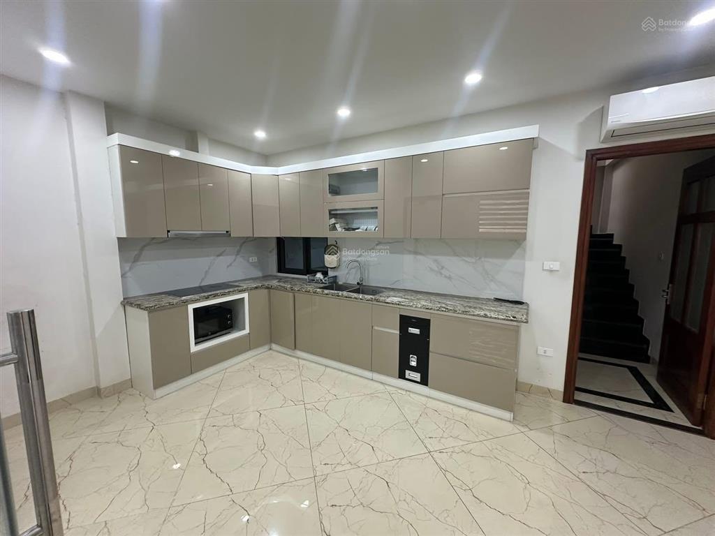 Bán nhà đỗ quang 70m2 x 6t x mt 5.2m, giá nhỉnh 30 tỷ, ô tô tránh, kd văn phòng vip