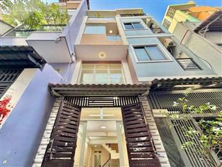 Nguyễn văn trỗi  phan đình phùng  trường sa cách quận 1 một cây cầu  4 tầng 33m2 chỉ 5.x tỉ