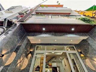 Mới ở ngay 4 tầng4pn ngang 4.4m 49m2 gần hẻm xe hơi phan đình phùng giáp q1 chỉ 7.62 tỷ