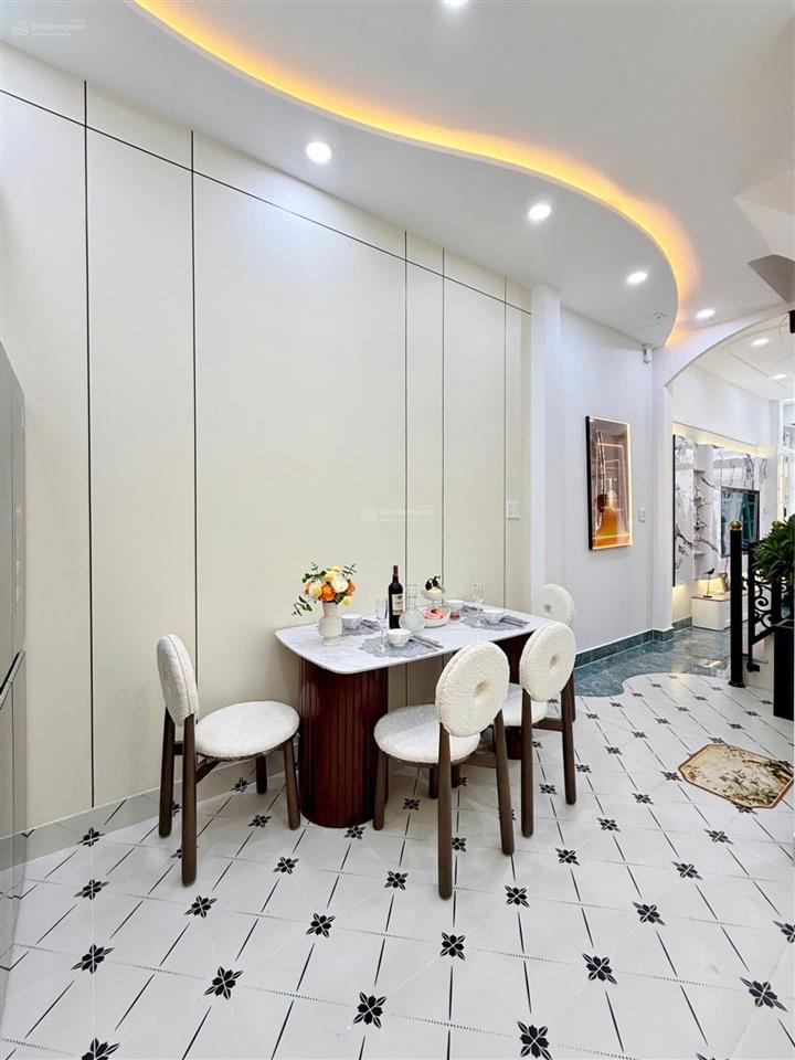Đoàn thị điểmphan xích long, 4 tầng đẹp mới, hẻm xe hơi 6m thông,5pn, 150m2 sd, 12 tỷ hơn