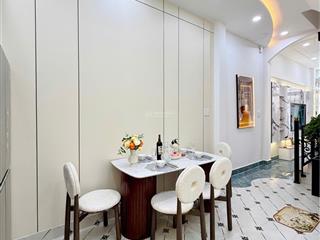 Đoàn thị điểmphan xích long, 4 tầng đẹp mới, hẻm xe hơi 6m thông,5pn, 150m2 sd, 12 tỷ hơn