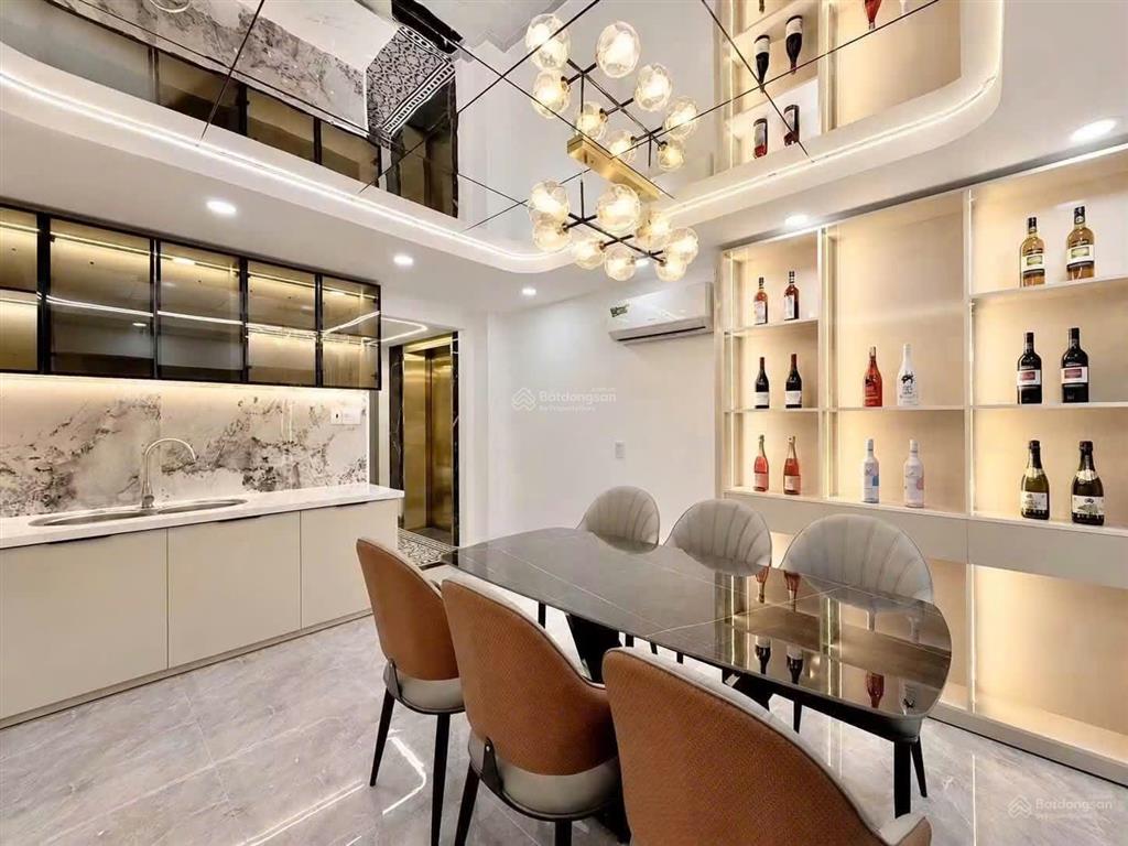 Giáp phan đăng lưu, 5 tầng thang máy mới đẹp, 52m2, hẻm xe hơi, ngang 3.9m nở hậu, 4pn, 10.92 tỷ