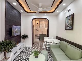 Sát quận 1  hẻm 3m 1 sẹc trường sa  nhà đẹp 2 tầng  2 pn  40m2 dtsd full nt  sổ a4 nở hậu