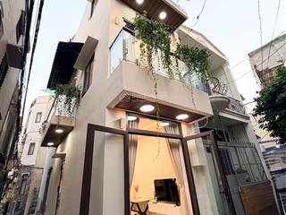 Minihouse lô góc 2 mặt hẻm cực thoáng  bùi đình túy  dtsd 45m2  nhà mới 3 tầng 2pn 3wc full nt