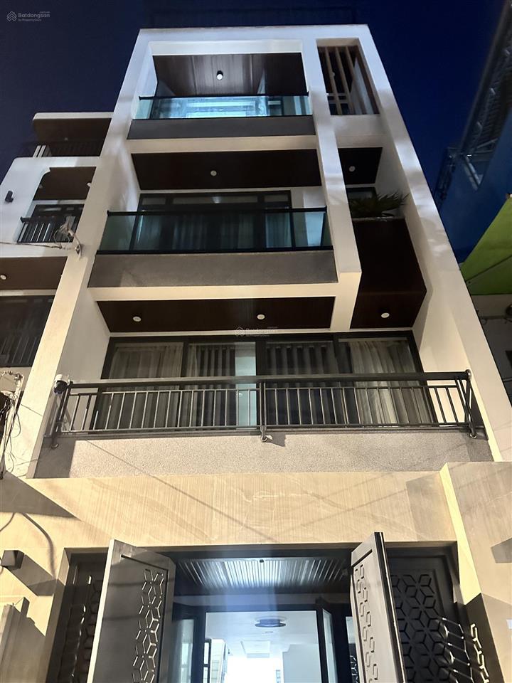 Bán nhà hxh quang trung p10 q gò vấp dt 4.5x18m kc 1 trệt 1 lửng 3 lầu thang máy giá 12.2 tỷ tl