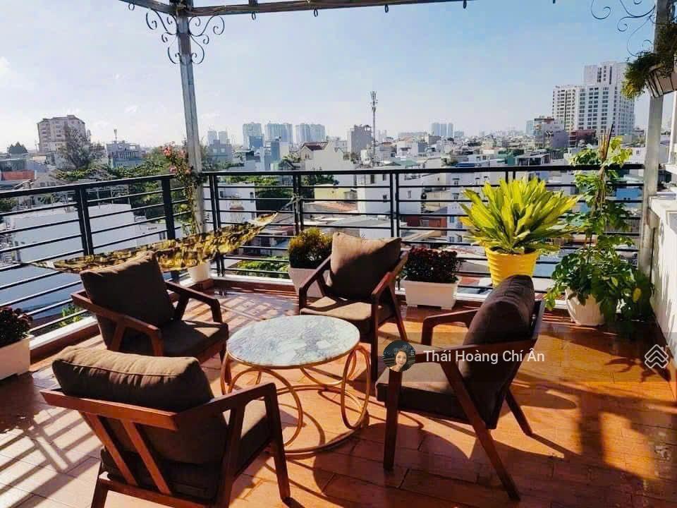 Nhà mặt tiền vĩnh hội quận 4 2 mặt đường trước sau dòng tiền 90 triệu/tháng 6 tầng thang máy