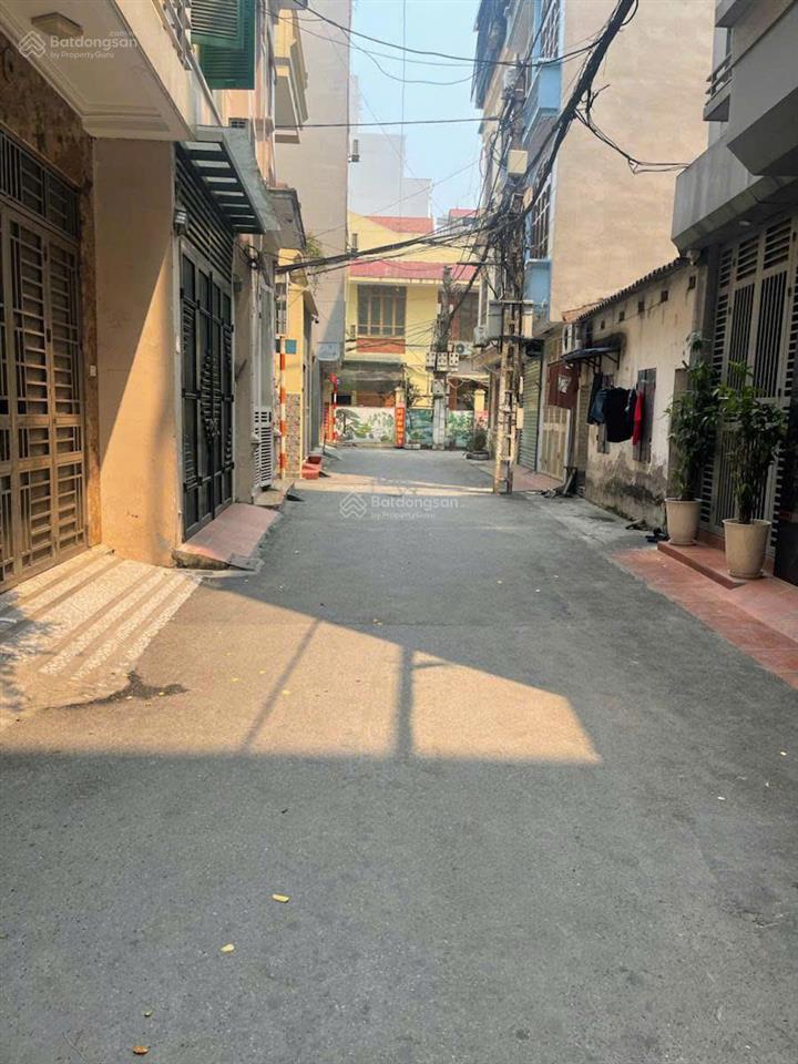 Bán đất tặng nhà phố hoàng văn thái, mặt tiền gần 6m, cách 1 nhà ra ô tô tránh, sổ đẹp, thoáng sau