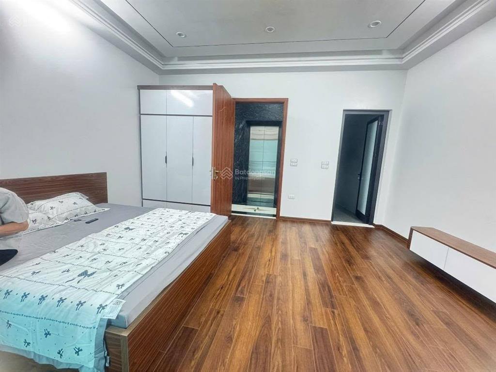 Bán nhà phố tôn đức thắng, 2 mặt thoáng, 7 tầng thang máy, 5 ngủ, full đồ, ngõ rộng, ko qh 100 năm