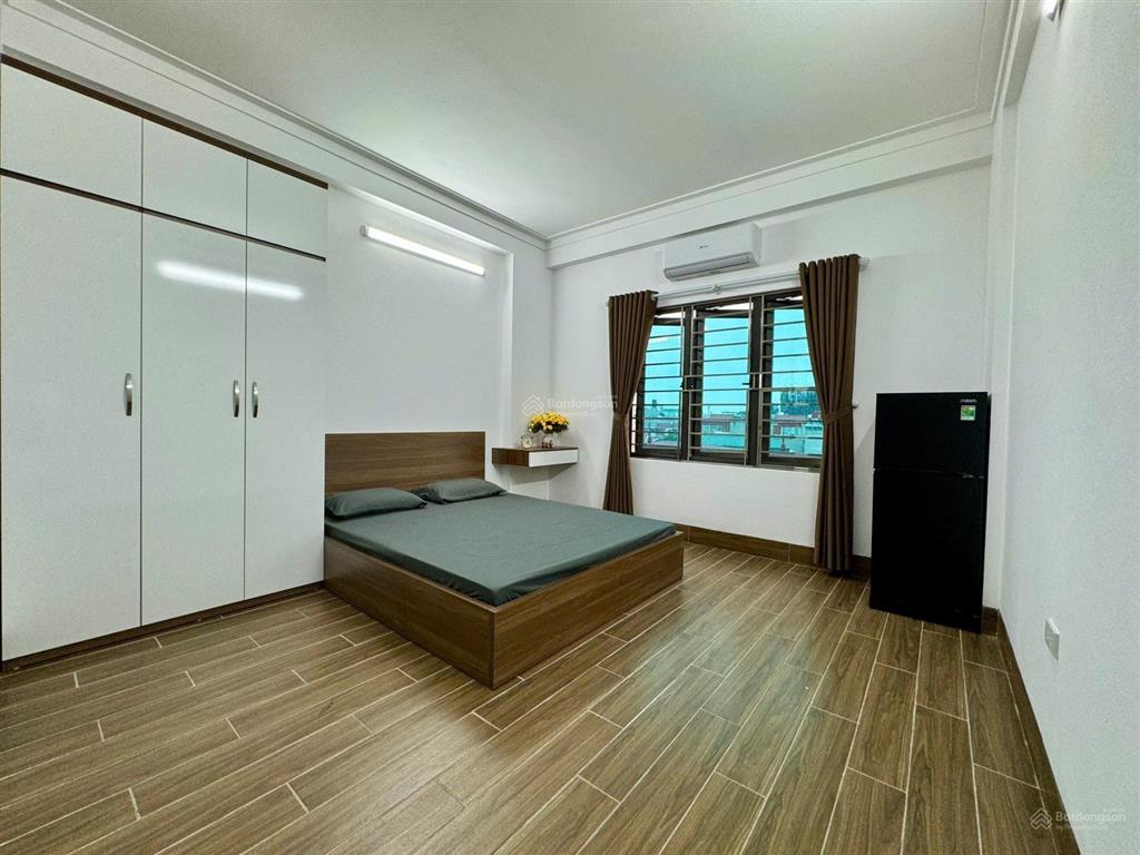 Bán ccmini lê đức thọ, 55m, 8 tầng, 14 phòng, doanh thu 80tr/th, ngõ thông, ô tô đỗ cửa