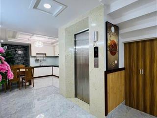 Nhà đẹp chính chủ có thang máy, dt 90m2, 5 tầng hẻm xe hơi ngay emart phan huy ích hơn 10 tỷ tl