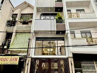 Bán nhà 6 tầng hiện đại + thang máy  cmt8 ô tô ngủ nhà 6pn lớn sổ đẹp giao dịch ngay .