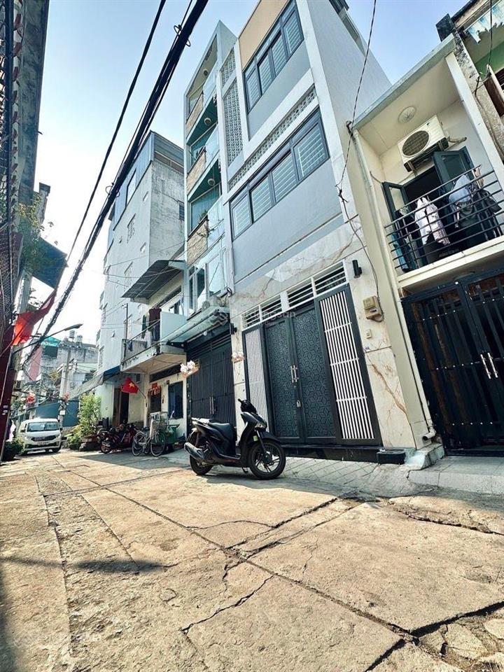 Âu cơ giáp quận 10  ô tô ngủ nhà thoải mái  nhà mới đẹp 4 tầng 4pn sẵn nội thất hơn 7 đồng .