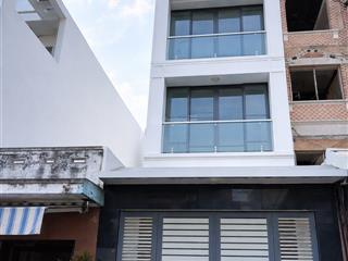 Chủ ngộp bank  lạc long quân ngã 4 âu cơ  sd 215m2 đường 8m ô tô ngủ nhà  5 tầng lung linh