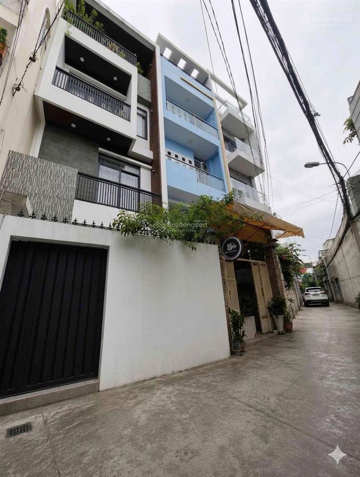 Âu cơ ngay vòng xoay lê đại hành 4 tầng 17  ô tô đổ cửa cách 30m mặt tiền 5 tầng rộng thoáng.